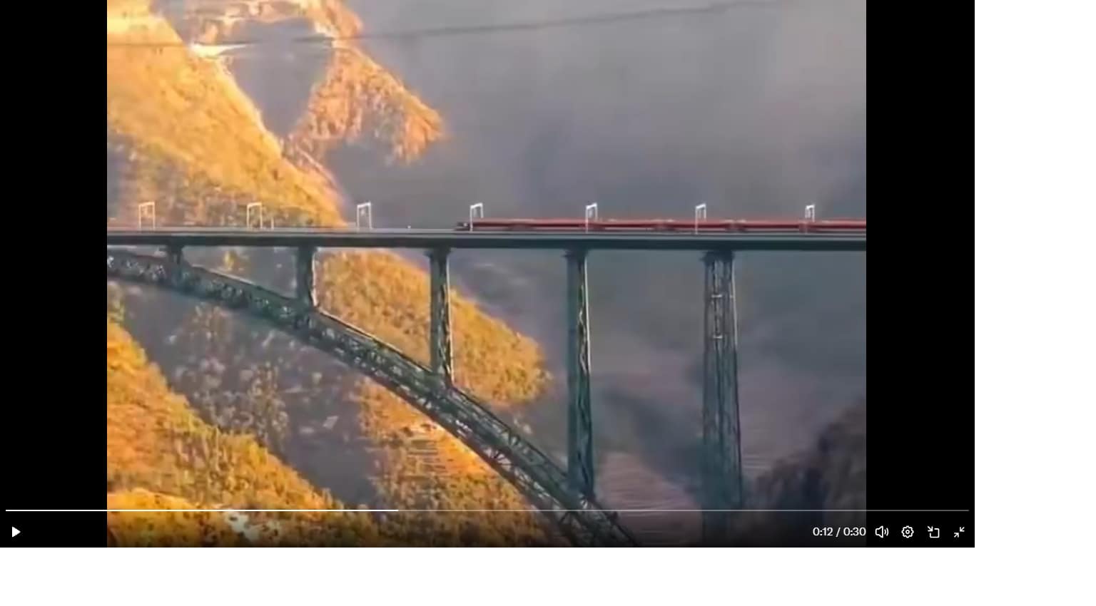 Vande Bharat Express on Chenab Bridge: Inside India's Greatest Railway Engineering Marvel 1 Vande Bharat Express train crossing the Chenab Bridge, world's highest railway arch bridge in Jammu and Kashmir